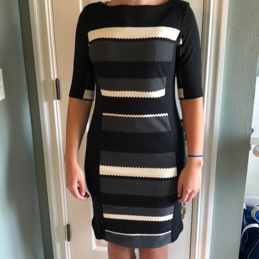Black dress with red zipper